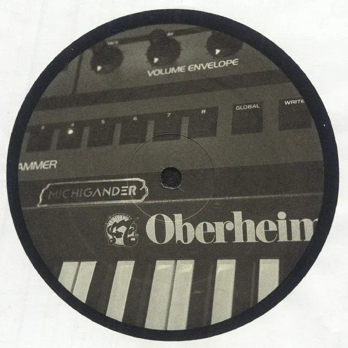 Vinyl record with Oberheim synthesizer graphic, Michigander label, and volume envelope text.