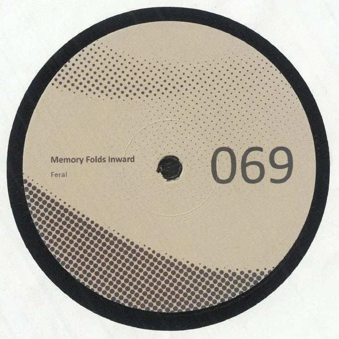 Vinyl record label with text 'Memory Folds Inward Feral' and number 069, dot pattern design.