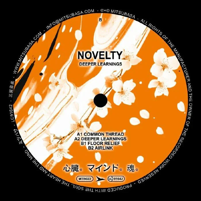 Orange and white vinyl record label with white cherry blossoms and tracklist for Novelty Deeper Learnings.