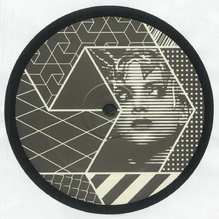 Geometric vinyl record with abstract face and patterned black and white design