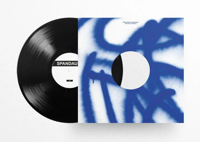 Black vinyl record with SPANDAU label, abstract blue and white sleeve on white background