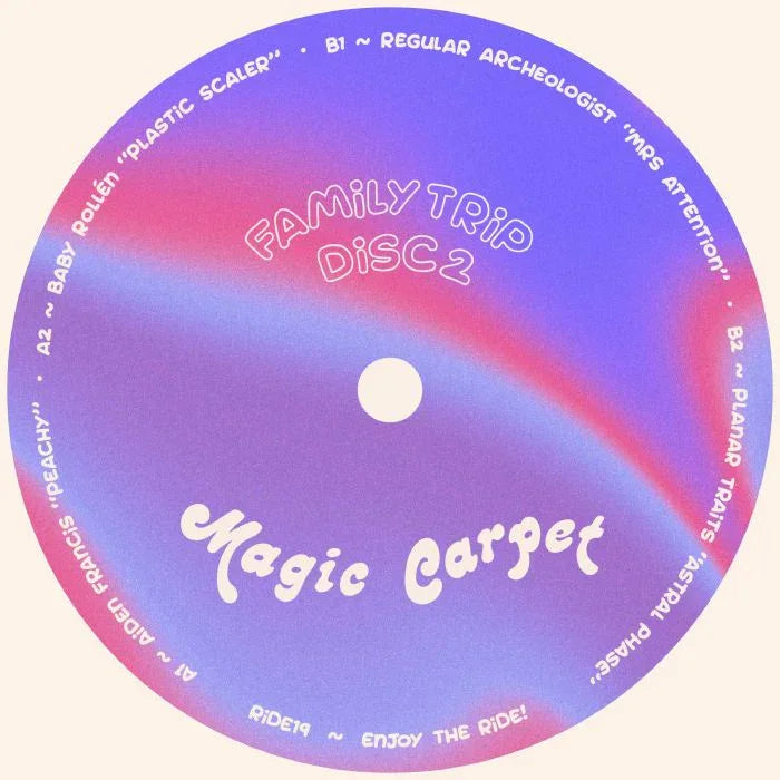 Magic Carpet vinyl record with pastel gradient label, Family Trip Disc 2, tracklist visible