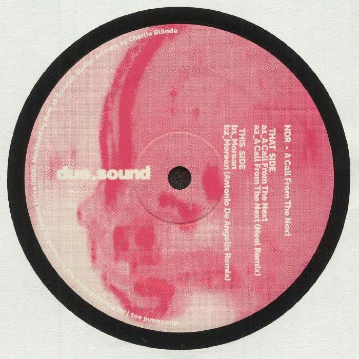 Pink vinyl record with abstract face design and white text listing track details and artist names.