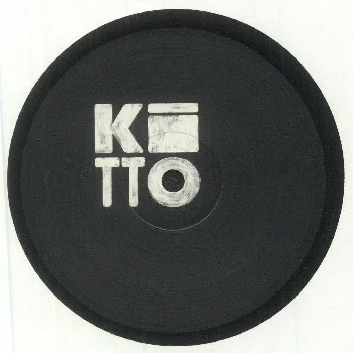 Black vinyl record with white stylized KOTTO text on the center label