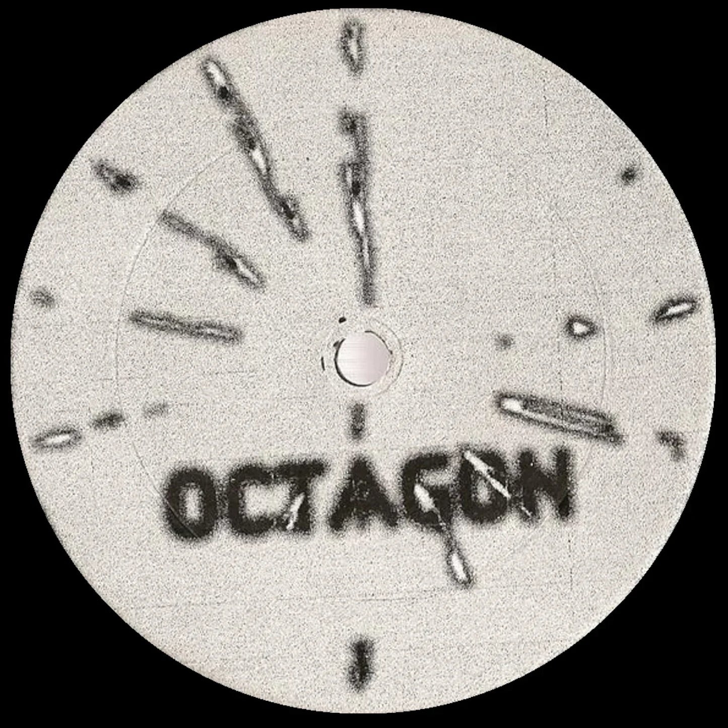 Spray-painted vinyl record label with 'OCTAGON' text and black abstract clock lines.
