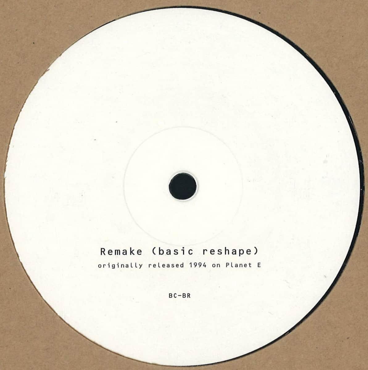 White vinyl record labeled 'Remake (basic reshape)' with minimal black text on brown sleeve.