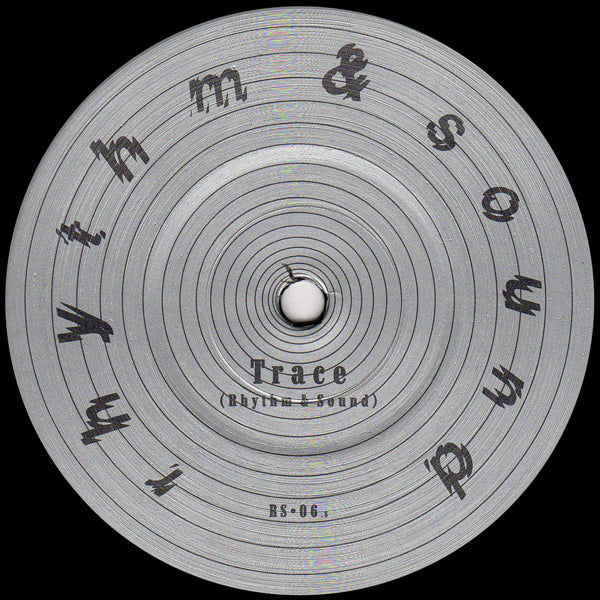 Close-up of a vinyl record label with circular grooves, featuring 'Trace' and 'Rhythm & Sound' text