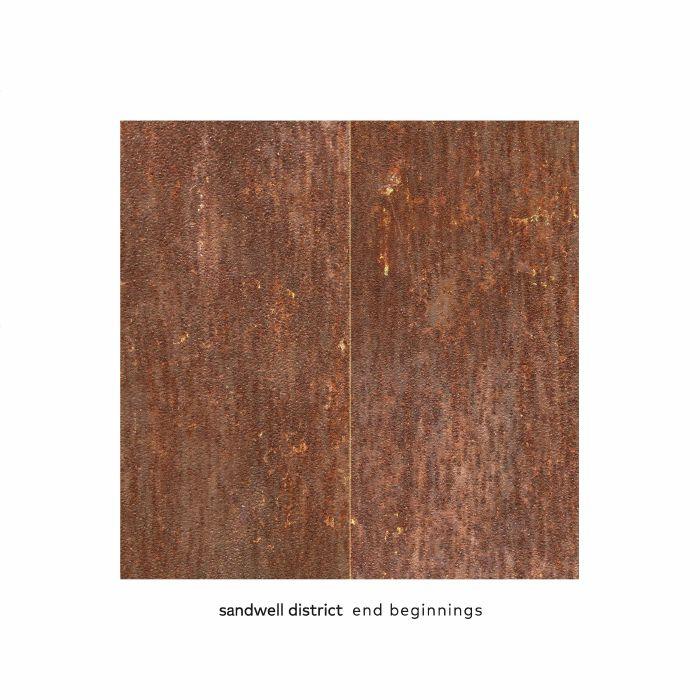 Sandwell District End Beginnings album cover with textured brown abstract art
