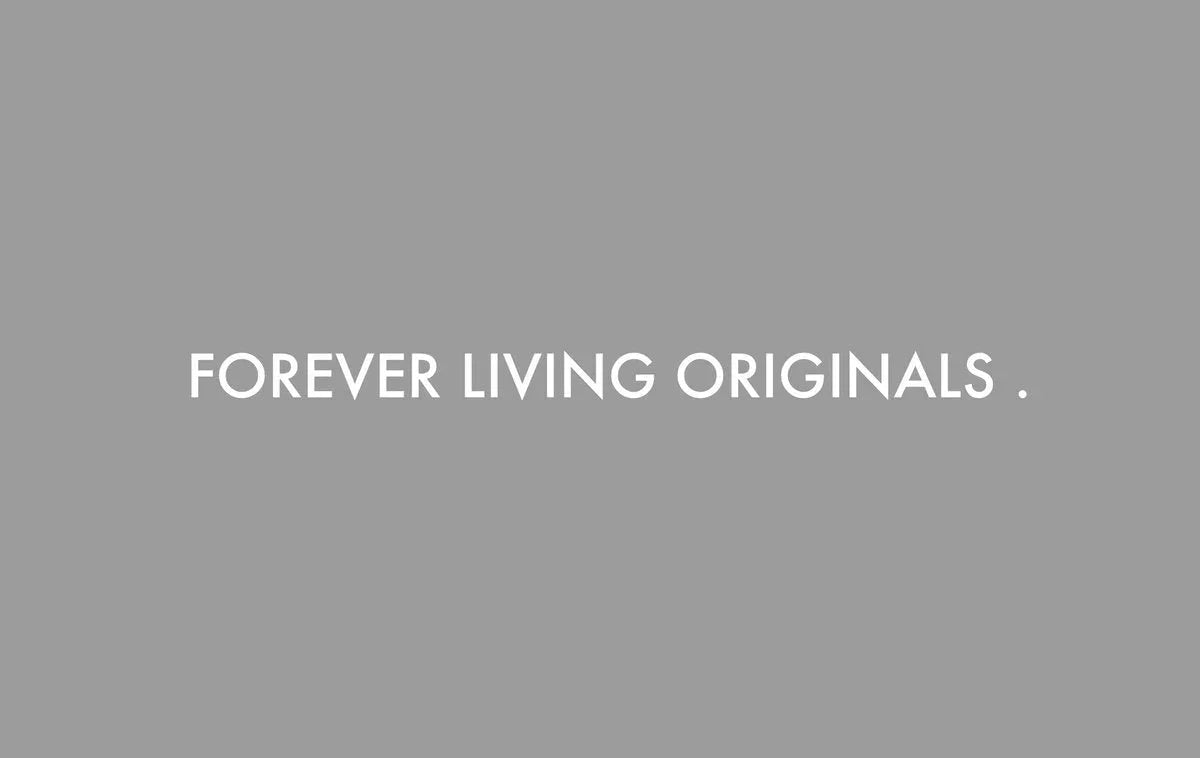 Forever Living Originals text in white on a plain grey background