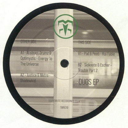 Duos EP vinyl record label featuring tracklist, abstract logo, Transmute Recordings 2024
