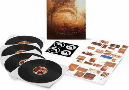 Aphex Twin music box set with four vinyl records, album cover, stickers, and art print