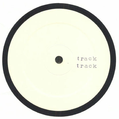 Round white object with black rim and 'track' text on a white background