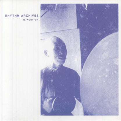 Vintage album cover featuring musician Al Wootton playing gong on Rhythm Archives