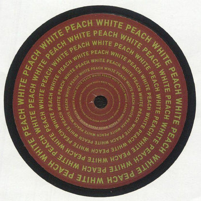 Vinyl record with repeat 'White Peach' text in yellow on brown circular label.