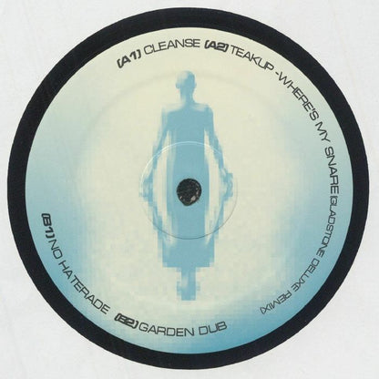 Vinyl record label with pixelated blue human figure and tracklist including Cleanse, Teak Up, and Garden Dub
