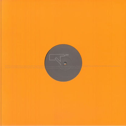 Vinyl record with a dark gray label in the center on a bright orange background