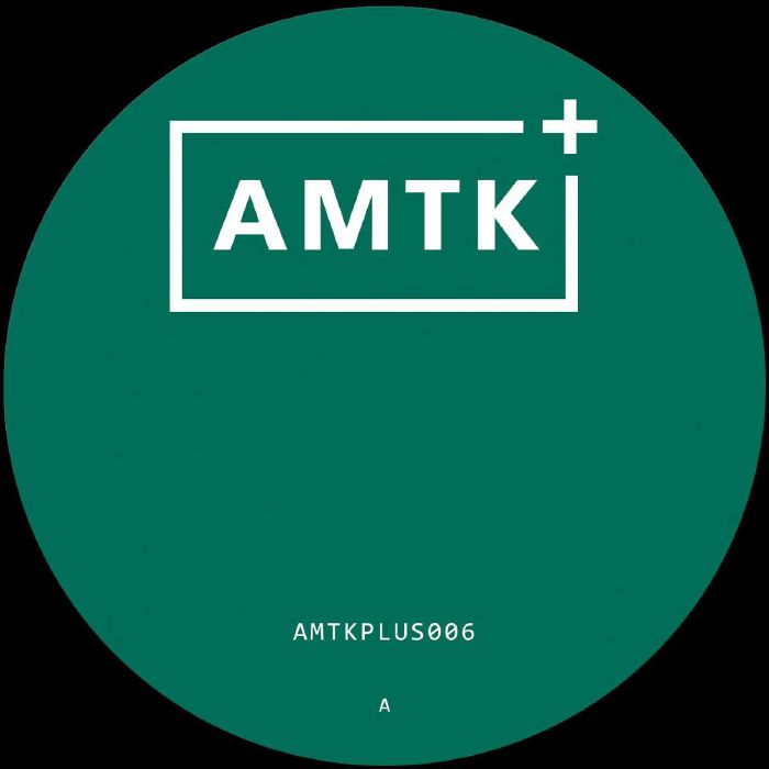 Green circular label with white AMTK plus logo and text AMTKPLUS006 at bottom