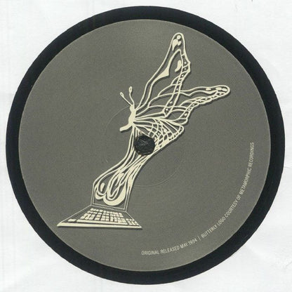 Record label design featuring a butterfly emerging from a computer keyboard with black and gray circular background