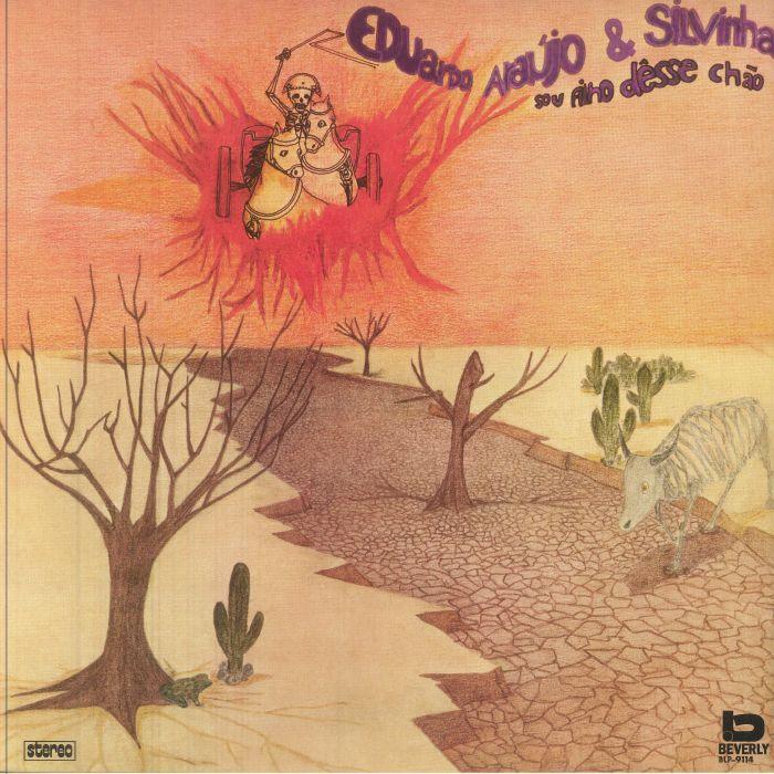 Surreal album cover with a skeleton in a chariot above a dry desert landscape, cracked earth, leafless trees, and a white bull.