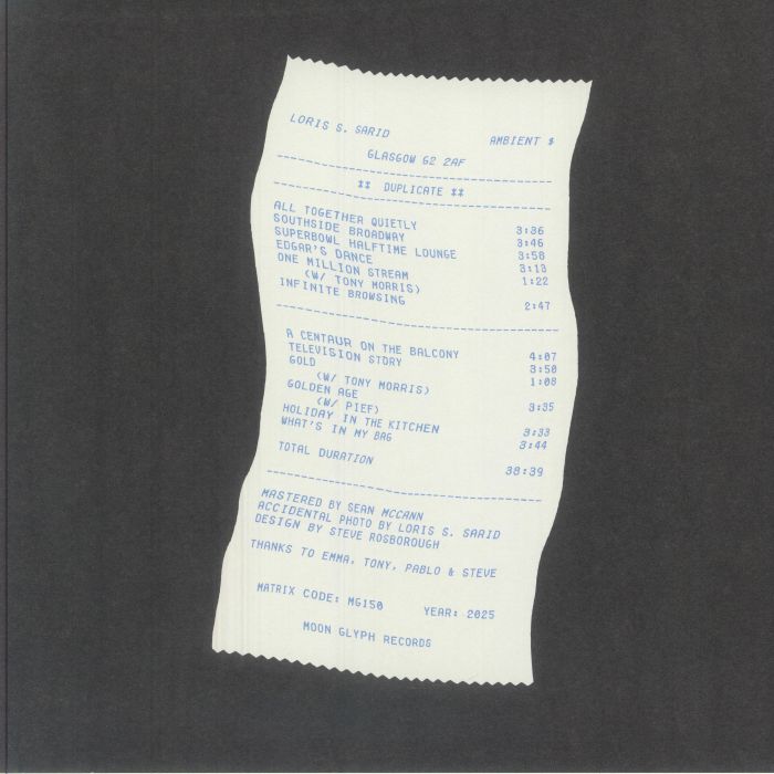 Sheet of white paper with blue typed text listing music tracks and album credits on a black background