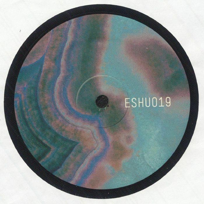 Vinyl record with abstract marbled label design and ESHU019 text on center