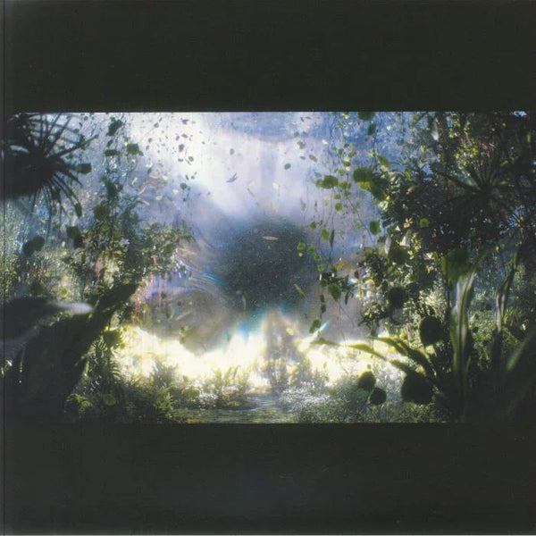 Futuristic landscape with a large central structure surrounded by lush greenery