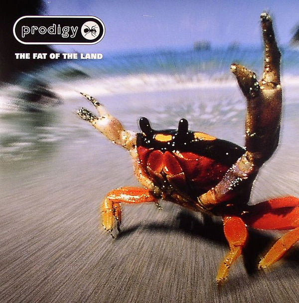 Album cover with a crab on a beach and Prodigy logo