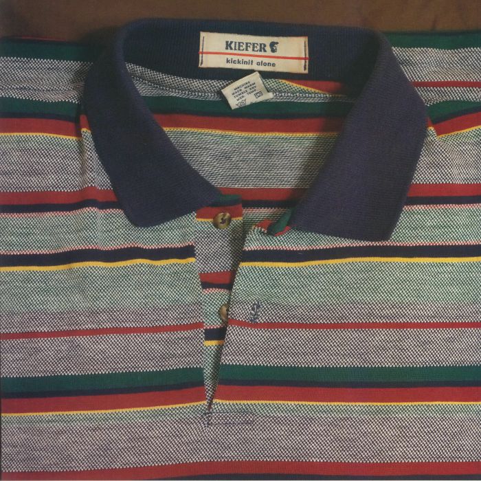 Kiefer striped polo shirt with navy collar and multicolor horizontal stripes, labeled kickinit alone