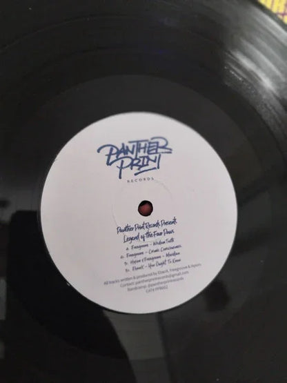 Black vinyl record with Panther Print Records label, close-up view of center label.