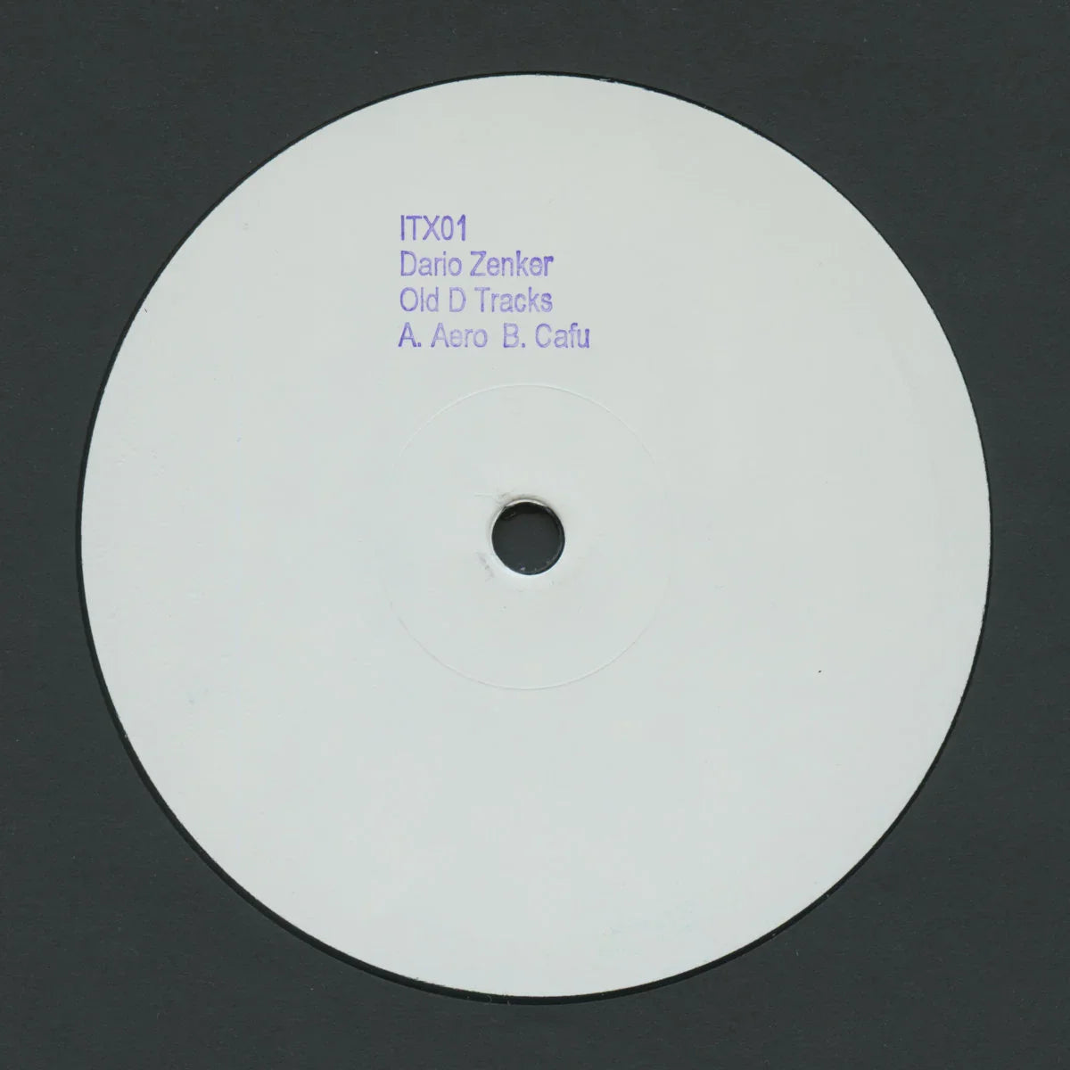 White vinyl record with text on a black background