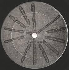 Vinyl record with abstract black pattern and gray background, electronic music release